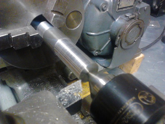 First pass on steel rod being turned