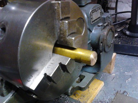 Faced and chamfered brass bar